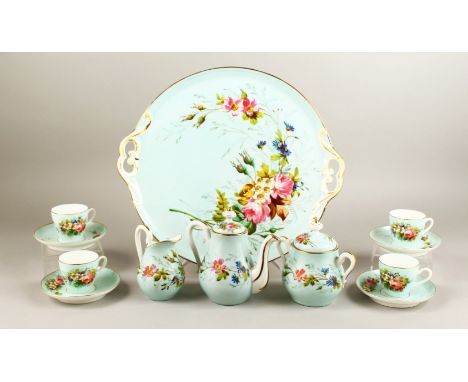 A GOOD FRENCH PORCELAIN CABARET comprising tray, teapot, sugar basin, milk jug, four cups and four saucers.