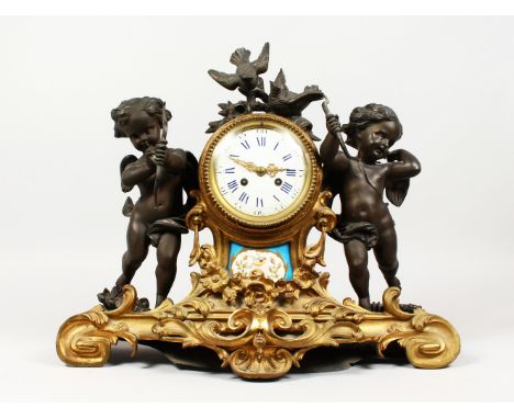 A LARGE 19TH CENTURY FRENCH LOUIS XVITH DESIGN CLOCK, with circular enamel dial, with eight day movement, with bronzed cupids