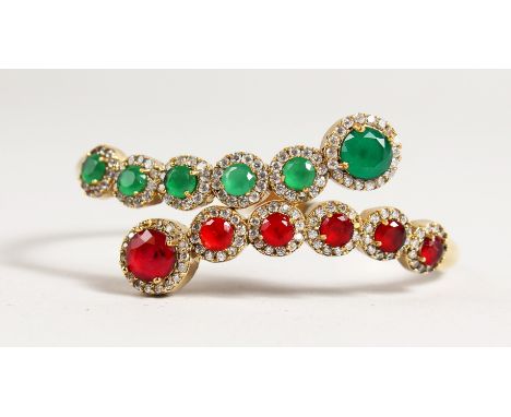 A SILVER AND GILT CHALCEDONY BANGLE.