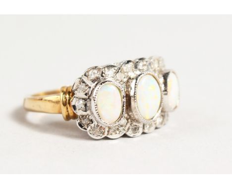 A 9CT GOLD OPAL AND DIAMOND RING.