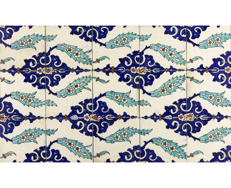 A framed Iznik style pottery tile panel, Kutahya, Turkey or Europe, early 20th century,   The cobalt blue, turquoise blue and