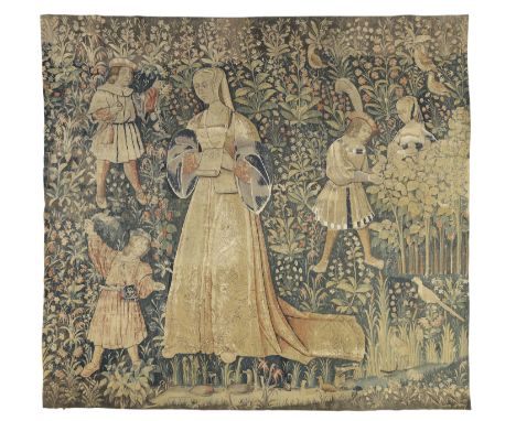 A Franco-Flemish millefleurs tapestry, Early 16th century,A noblewoman stands to centre reading a scroll in front of ducks sw