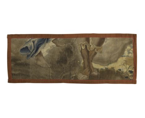 A Continental tapestry fragment, Possibly Brussels, late 17th century,Woven in wools and silks, depicting the bare feet of a 