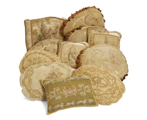 A group of eleven tapestry cushions,Mid-18th/19th century,Comprising: an Aubusson example with two deer in a wooded landscape