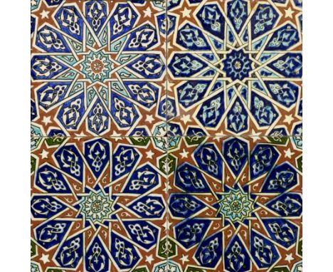 A framed geometric polychrome pottery tile panel, Turkey, 20th century, In the zelij style, four polygons with twelve radiati