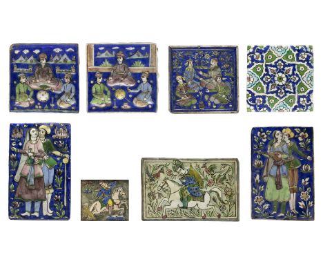Eight polychrome pottery tiles, Qajar Iran and later, 19th / 20th century, The first, moulded, a mounted hunter draws is bow,