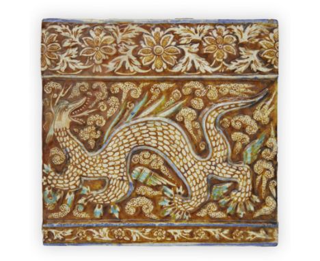 An Ilkhanid style lustre painted cobalt and turquoise moulded pottery tile, Qajar Iran, 19th century,   Of rectangular form, 