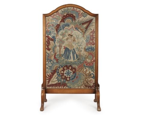 A English mahogany firescreen,Early 20th century,Inset with an 18th century and later needlework panel, worked in wools and s