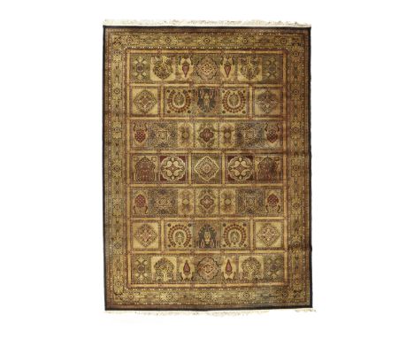 A Prado Orient Keshan super wool carpet, Last quarter 20th century, With tile design having various motifs, contained by flor