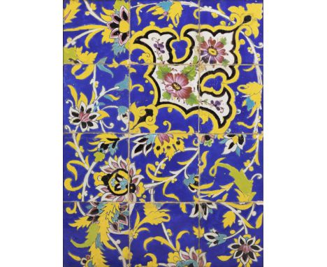 A large polychrome pottery tile panel, Qajar Iran, late 19th century, The blue and turquoise blue, yellow, green, pink and bl