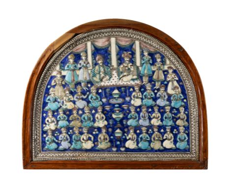 A large framed hemispherical moulded polychrome figural pottery tile, Tehran, Qajar Iran, c.1860, An interpretation of the Sa