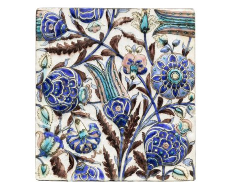 A near square moulded pottery tile in the Iznik style, Qajar Tehran, Iran, c.1860, The decoration consisting of an oversized 