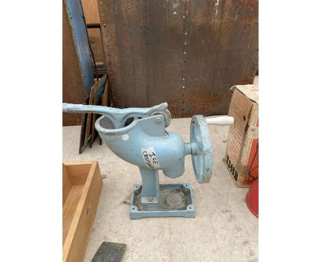 A VINTAGE METAL MANUAL ICE CRUSHER 