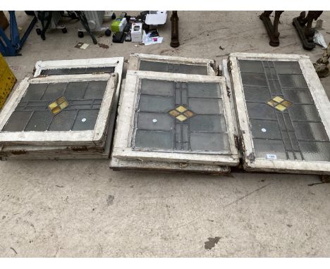 A QUANTITY OF VINTAGE WOODEN FRAMED STAIN GLASS WINDOWS 