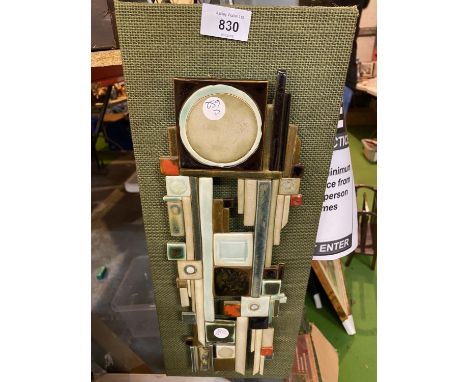 AN ABSTRACT CERAMIC WALL HANGING 
