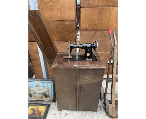 A VINTAGE SINGER SEWING MACHINE COMPLETE WITH CASE AND ORIGINAL FOOT PEDDLE AND INSTRUCTION MANUAL 