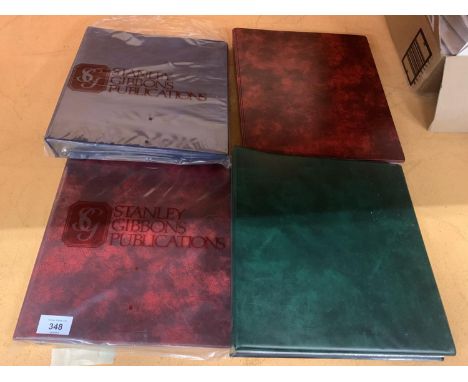 FOUR AS NEW ALBUMS FOR THE DISPLAY OF FIRST DAY COVERS TO INCLUDE TWO STANLEY GIBBONS EXAMPLES 