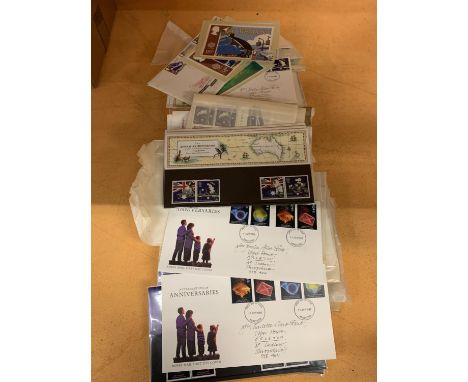 A LARGE COLLECTION OF FIRST DAY COVERS, POTSCARDS AND RELATED STAMPS 