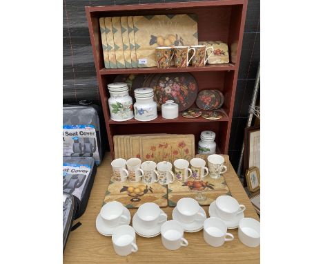 A LARGE COLLECTION OF KITCHEN ITEMS TO INCLUDE CUPS AND SAUCERS, PLACE MATS AND MUGS ETC 