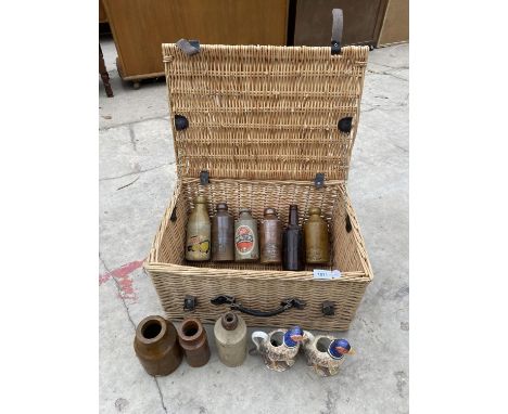 A WICKER HAMPER TO ALSO INCLUDE VINTAGE STONE WARE BOTTLES 