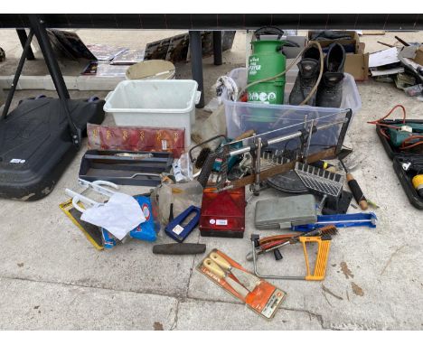 A LARGE ASSORTMENT OF HAND TOOLS TO INCLUDE A MITRE SAW, DRILLS, WIRE BRUSHES ETC 