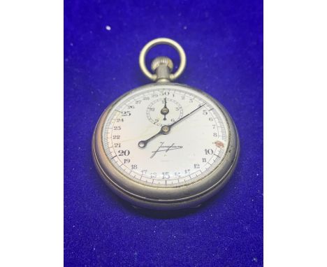 A VINTAGE JUNGHANS STOP WATCH IN WORKING ORDER (DAMAGE TO ENAMEL FACE SEE PHOTOGRAPH) 