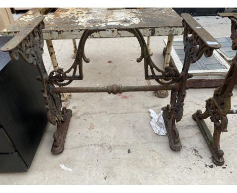 A VINTAGE AND DECORATIVE CAST IRON TABLE BASE 