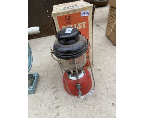 A VINTAGE TILLEY STORM LIGHT OIL LAMP 