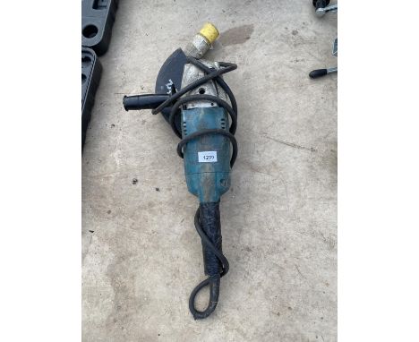 A MAKITA ANGLE GRINDER WITH A 110V PLUG 