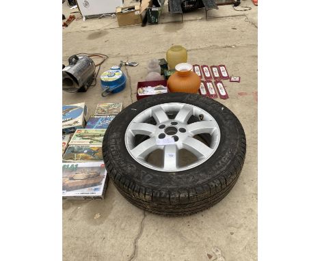 A FIVE STOOD CAR RIM WITH A MICHELIN 225/65 R 17 TYRE 