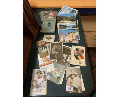 A LARGE QUANTITY OF VINTAGE POSTCARDS TO ALSO INCLUDE AN ALBUM OF CIGARETTE CARDS 