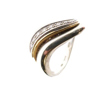 18ct two-colour gold dress ring, the shaped band set with nine single cut diamonds, size M½ approx, 5.6g gross approx