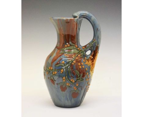 Elton Ware (Clevedon) pottery ewer, cylindrical with shaped rim, inscribed with flowering foliage, on a streaked blue and ter