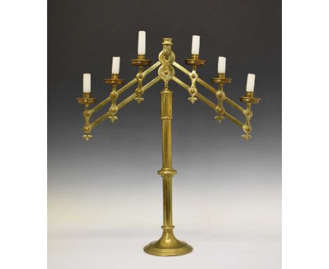 Early 20th Century brass adjustable six light candelabra or menorah by (Maurice) Vanpoulle, each having a ring-incised cylind