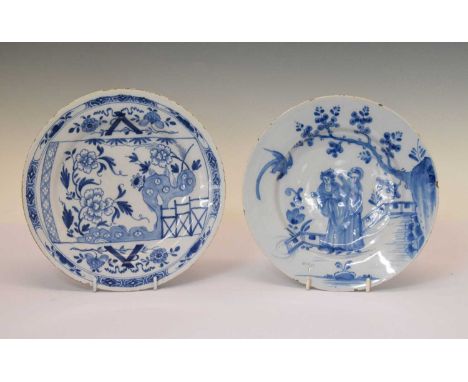 Two mid-18th Century Chinoiserie influence English delftware plates, one painted with Chinese type figures in a garden with b