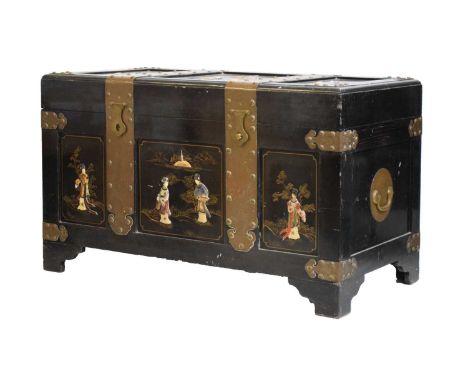 Early 20th Century Chinese lacquered, inlaid and brass bound trunk, the rectangular top and front with fielded panels mounted
