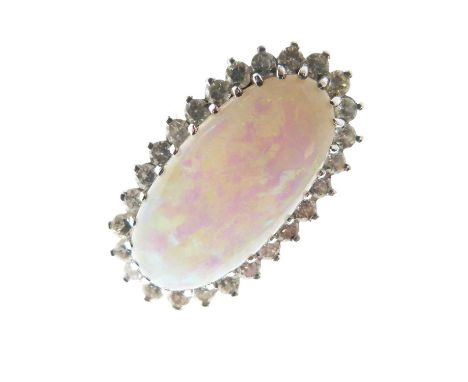 Opal and diamond cluster ring, the white mount with a stamped mark, the long cabochon approximately 24mm x 11.5mm x 4.2mm dee