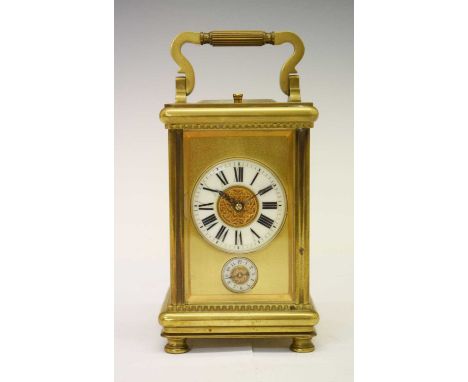 Early 20th Century brass cased repeater carriage clock, with Roman chapter ring over Arabic alarum dial, the two-train moveme