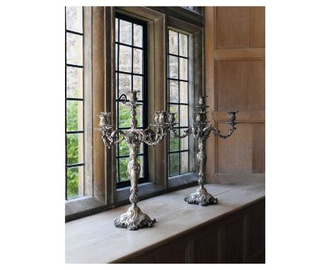 Impressive pair of 19th Century silver-plated four-branch (five-light) table candelabra, each having foliate scroll branches,