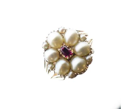 Victorian ruby and pearl mourning ring, the ruby enclosed by six pearls and six small pearl points (pearls untested and unwar