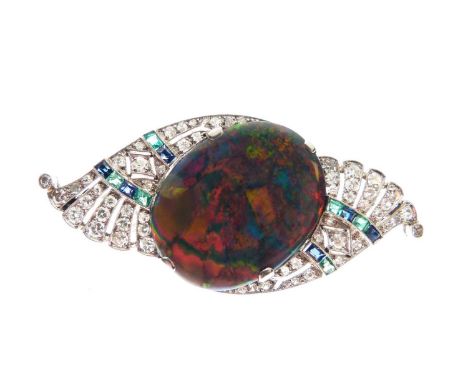 Black opal, diamond, calibré emerald and sapphire brooch, the mount in unmarked white metal, the oval opal measuring approxim