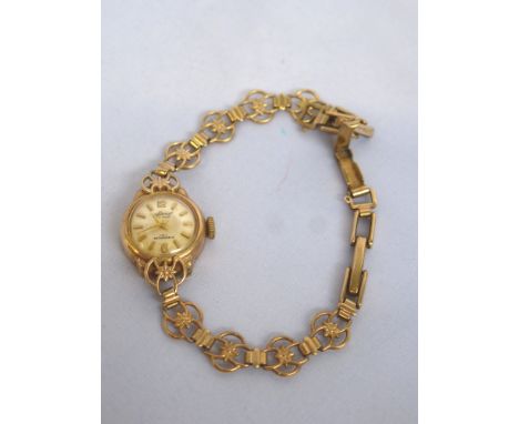 9K GOLD ACCURIST LADIES WATCH TOTAL W: 12G, APPROX 8G WITHOUT WORKINGS