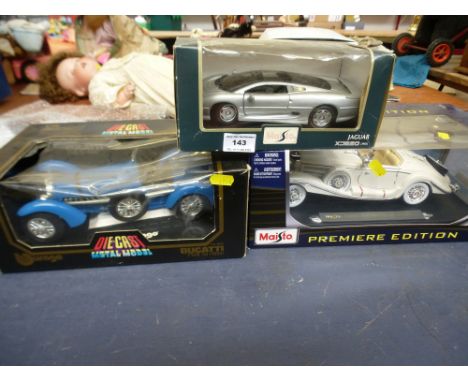 3 BOXED CARS - MAISTO MERCEDES, MAISTO JAGUAR AND BURAGO BUGATTI