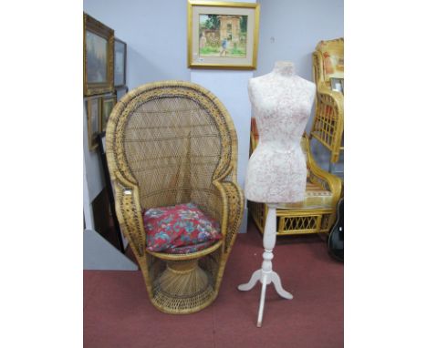 A Wicker Peacock Chair, 135cm high, Female mannequin, on white painted tripod base. (2).