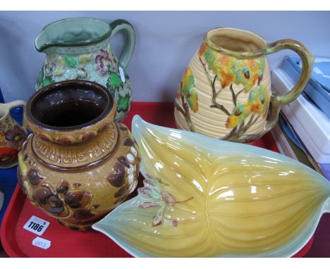 A Carlton Ware Ribbed and Leaf Moulded Jug, with twig handle, Radford leaf and flower mottled jug, a shorter shaped bowl and 