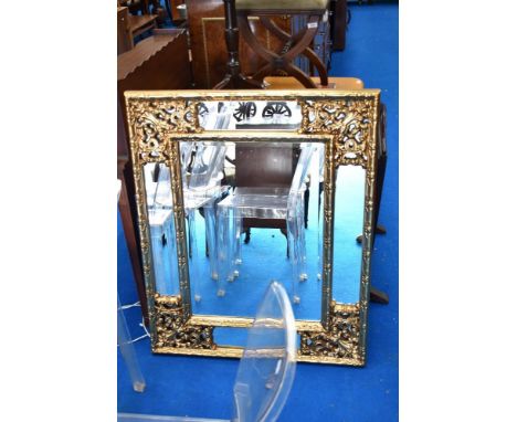 A modern multi panel decorative wall mirror having gilt frame