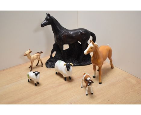 A Beswick pottery Ayshire calf study, number 1249b, designed in Arthur Gredington in brown and white gloss, 7cm sold along wi