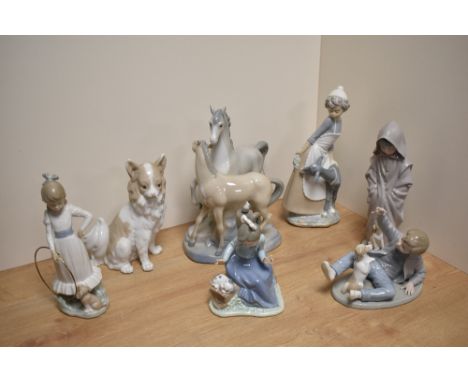 A group of seven Lladro porcelain style studies, figurines and groups, six being Nao porcelain, including girl with goat, boy