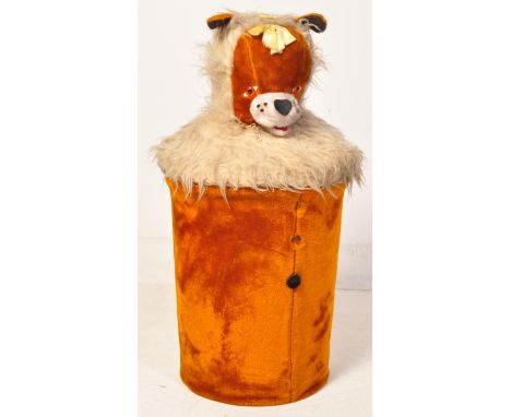 A vintage retro 20th century upholstered laundry basket in the form of a dog with stitched features.&nbsp;Measures approx: 90