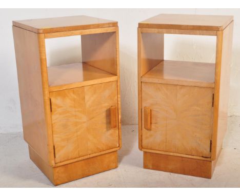 An Art Deco circa 1930s feathered walnut pair of true bedside cabinets. Each&nbsp; having an inset top over an open recess sh